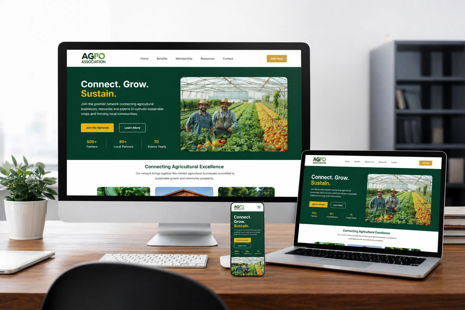 Agro Association website displayed across desktop, laptop and mobile devices